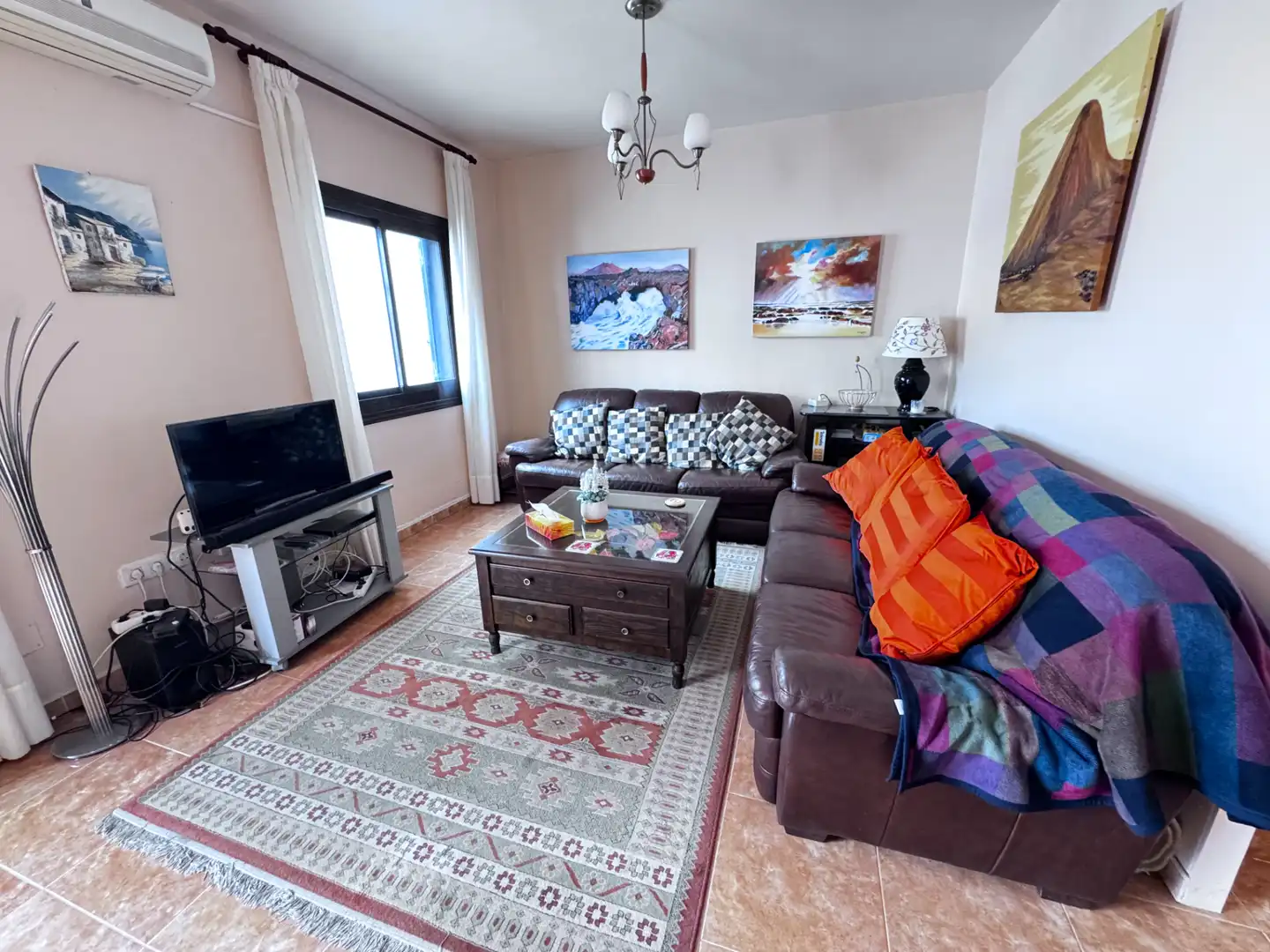 Sala de estar de Casa adosada en venta en Teguise con Jardín privado, Terraza y Amueblado