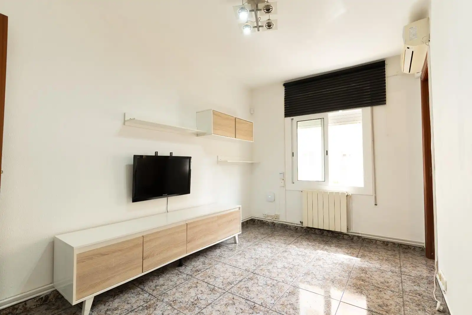 Sala d'estar de Apartament en venda en L'Hospitalet de Llobregat amb Aire condicionat i Calefacció