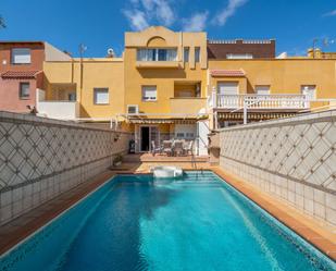 Swimming pool of House or chalet for sale in  Almería Capital  with Air Conditioner, Heating and Private garden