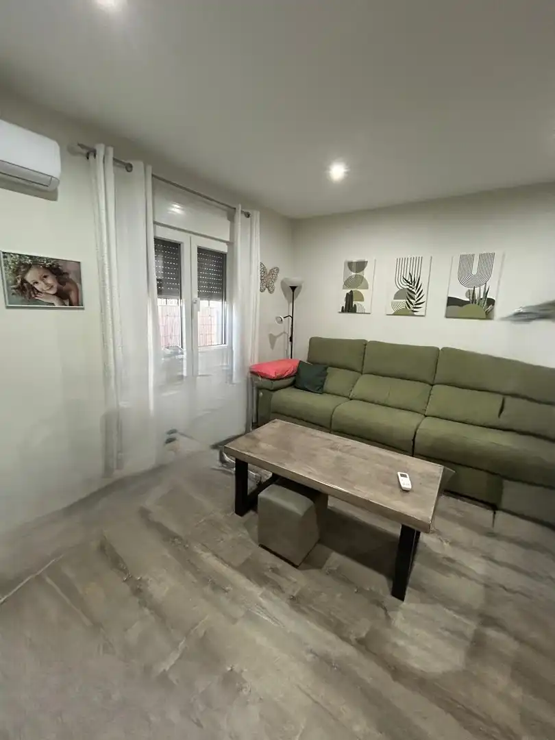 Sala de estar de Planta baja en venta en Málaga con Aire acondicionado, Terraza y Amueblado