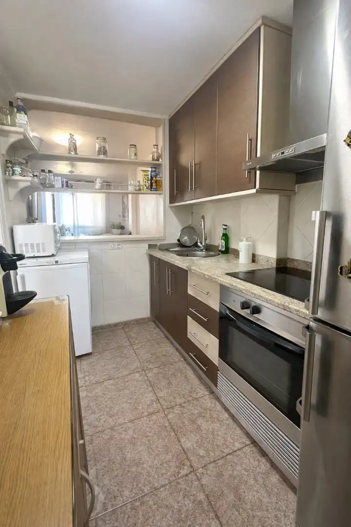 Kitchen of Flat for sale in Almería  with Air Conditioner, Terrace and Community pool