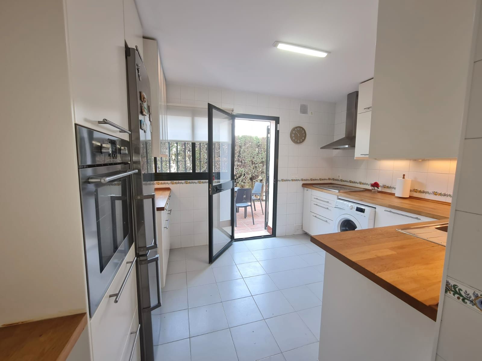 Cocina de Casa o chalet de alquiler en Espartinas con Aire acondicionado, Jardín privado y Piscina