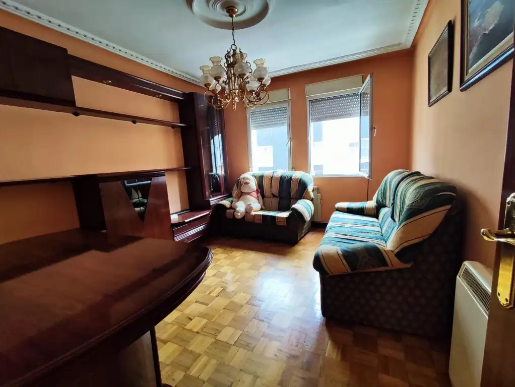 Sala de estar de Piso en venta en Gijón  con Calefacción, Parquet y Amueblado