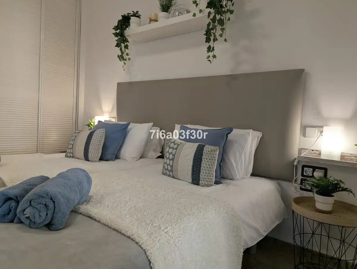 Schlafzimmer von Wohnungen zum Verkauf in Marbella mit Heizung, Privatgarten und Terrasse