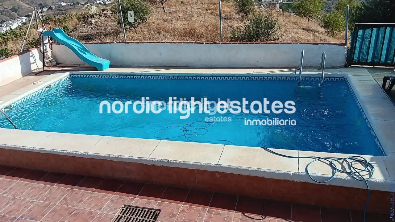 Casa amb piscina en venda a El Borge, imagen 3
