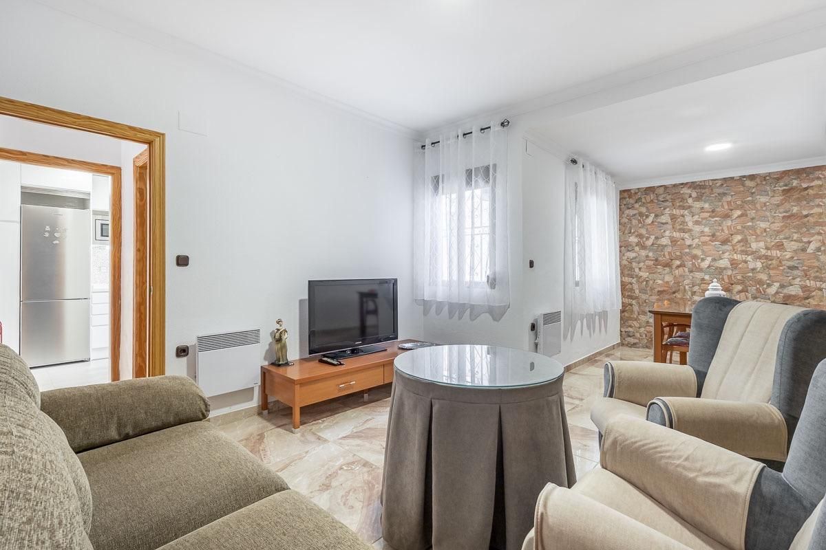 Sala d'estar de Casa o xalet en venda en Maracena amb Aire condicionat, Terrassa i Traster