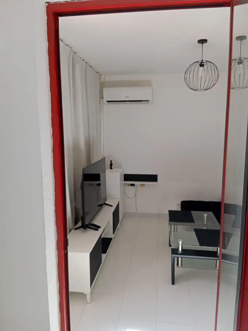 Sala d'estar de Apartament en venda en Benidorm amb Aire condicionat, Jardí privat i Terrassa