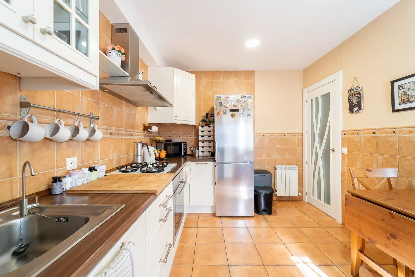 Cocina de Casa adosada en venta en La Torre de Esteban Hambrán con Aire acondicionado, Calefacción y Jardín privado
