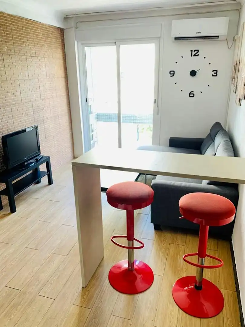 Living room of Flat for share in Sevilla  with Air Conditioner, Furnished and Washing machine