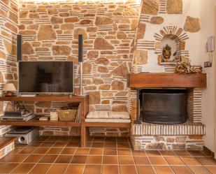 Sala d'estar de Casa adosada de lloguer en Castell-Platja d'Aro amb Calefacció, Jardí privat i Terrassa