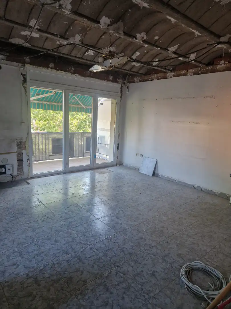 Sala d'estar de Casa adosada en venda en Sant Quirze del Vallès amb Calefacció, Jardí privat i Terrassa