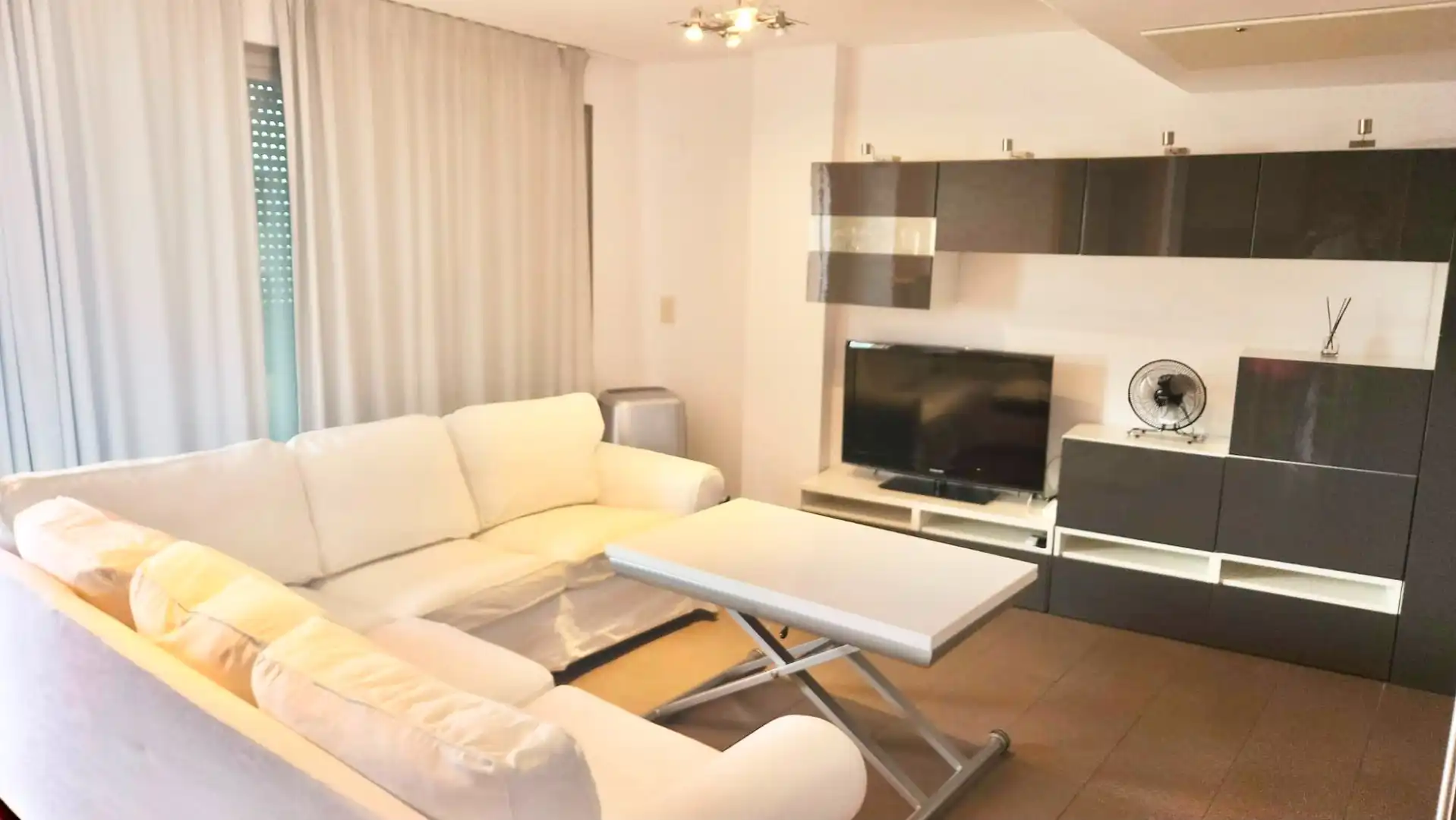 Sala de estar de Apartamento de alquiler en Calpe / Calp con Aire acondicionado, Piscina y Amueblado