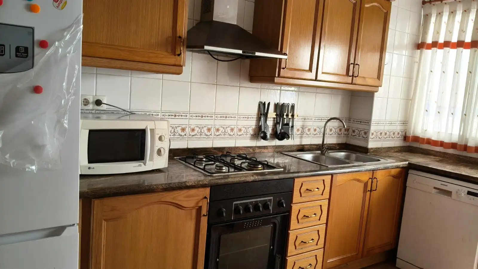 Cuina de Casa adosada en venda en Puçol amb Calefacció, Traster i Forn