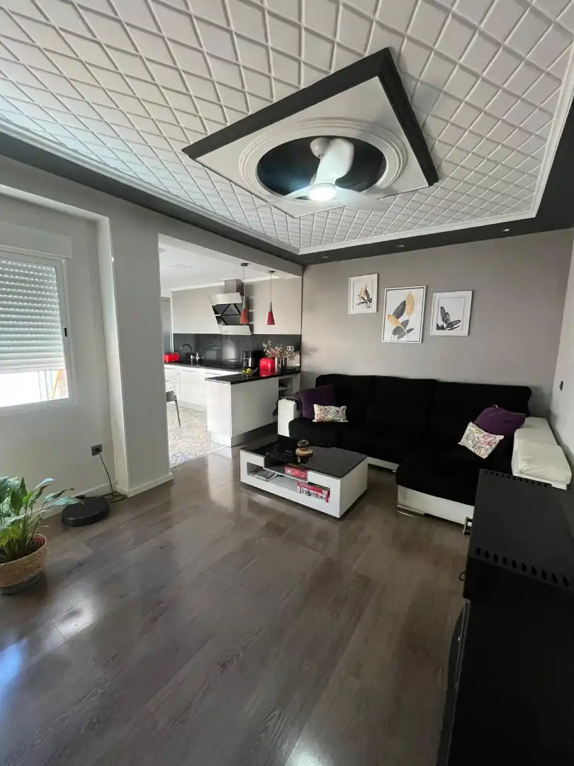 Sala de estar de Casa adosada en venta en El Real de Gandia con Aire acondicionado, Amueblado y Horno