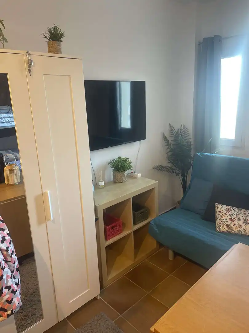 Sala de estar de Estudio para compartir en Sierra Nevada con Aire acondicionado, Terraza y Amueblado