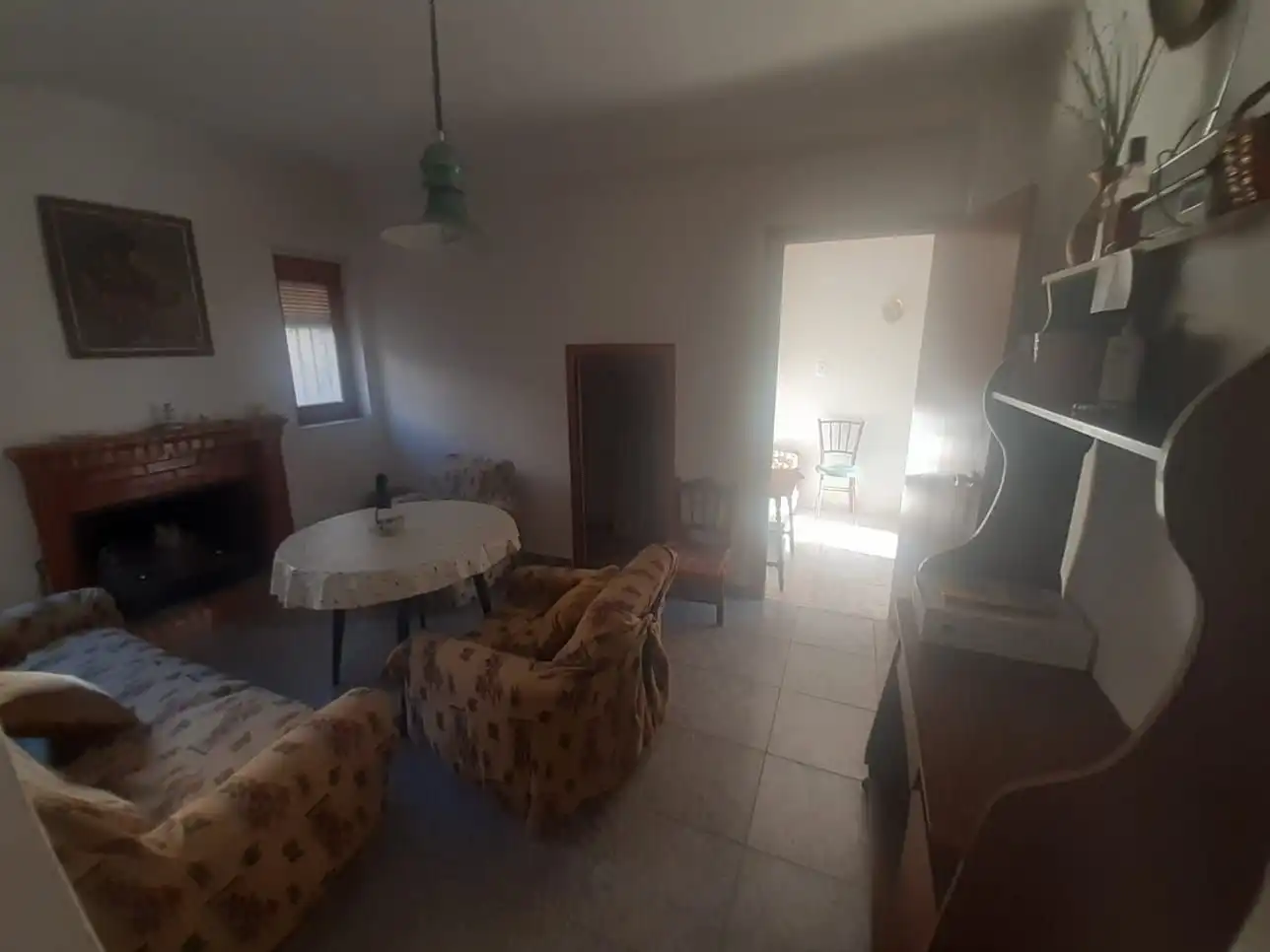 Sala d'estar de Casa o xalet en venda en Baza amb Terrassa i Balcó