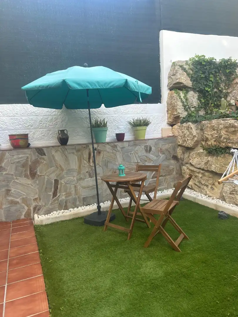 Terrasse von Einfamilien-Reihenhaus zum Verkauf in Torremolinos mit Klimaanlage, Privatgarten und Terrasse