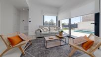 Sala d'estar de Casa o xalet en venda en Finestrat amb Aire condicionat, Terrassa i Piscina