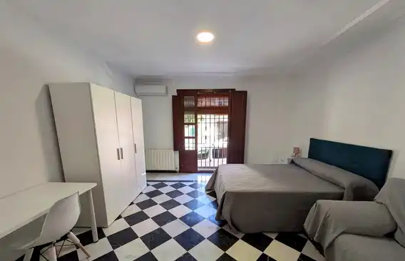 Habitación de Casa o chalet para compartir en Linares con Aire acondicionado, Terraza y Amueblado