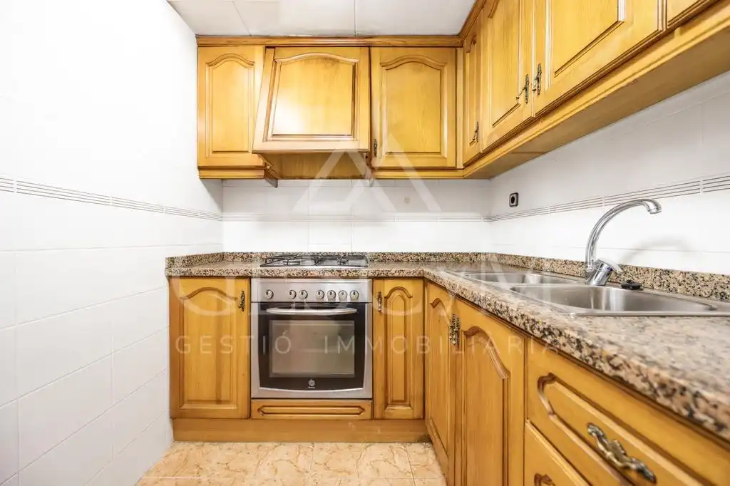 Cuina de Casa adosada en venda en Sabadell amb Calefacció i Terrassa