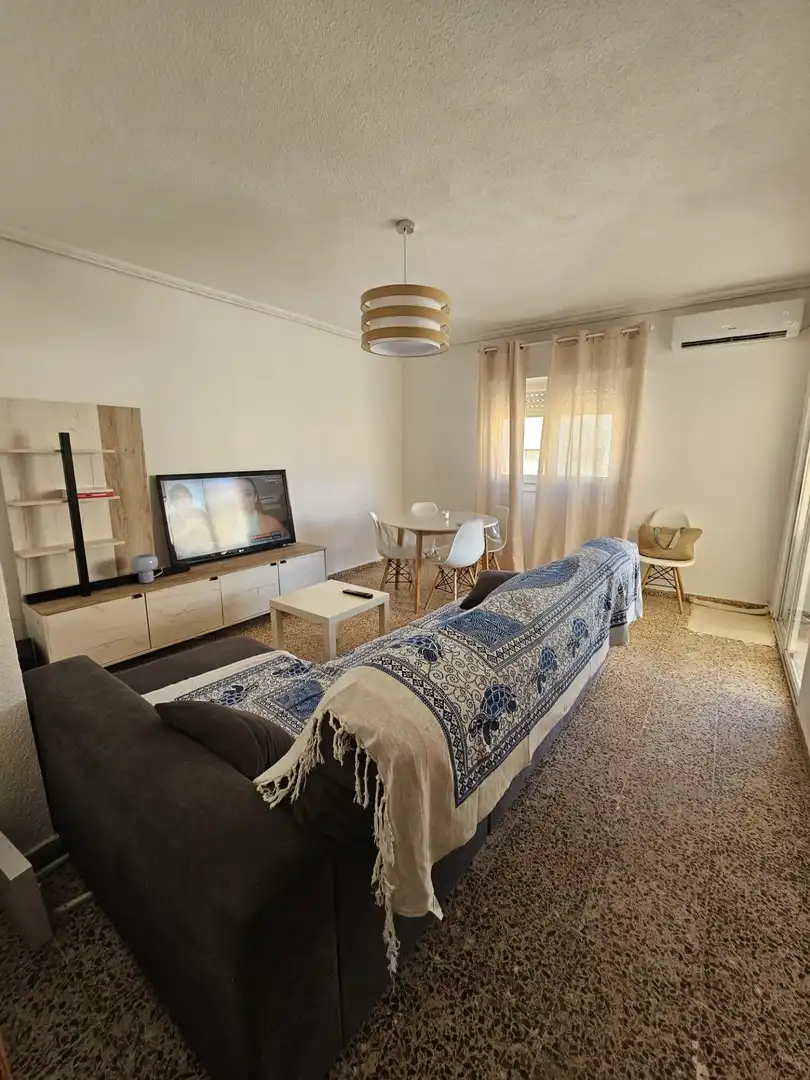 Sala de estar de Piso en venta en Tavernes de la Valldigna con Aire acondicionado, Terraza y Amueblado