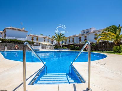 Vista exterior de Casa o xalet en venda en Almonte amb Terrassa i Piscina