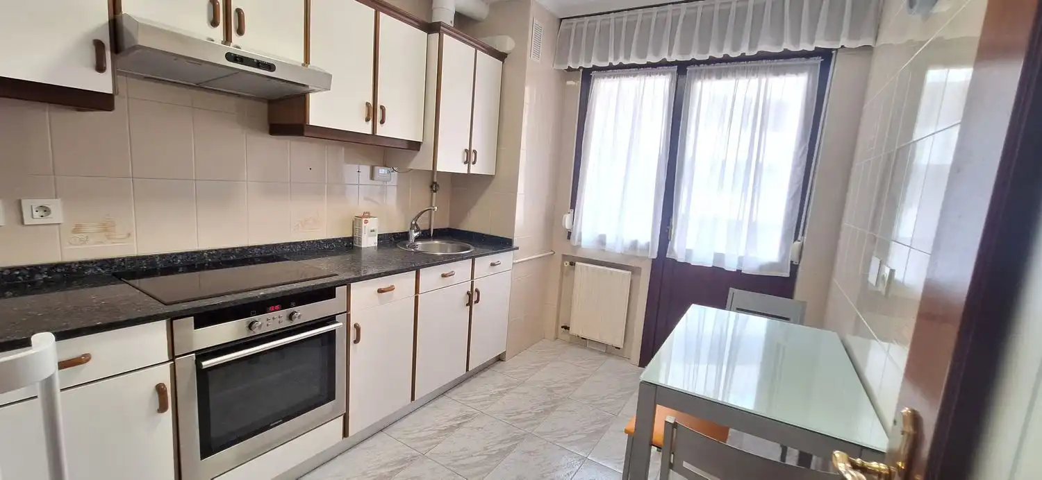 Kitchen of Flat for rent in Gijón   with Heating, Terrace and Swimming Pool