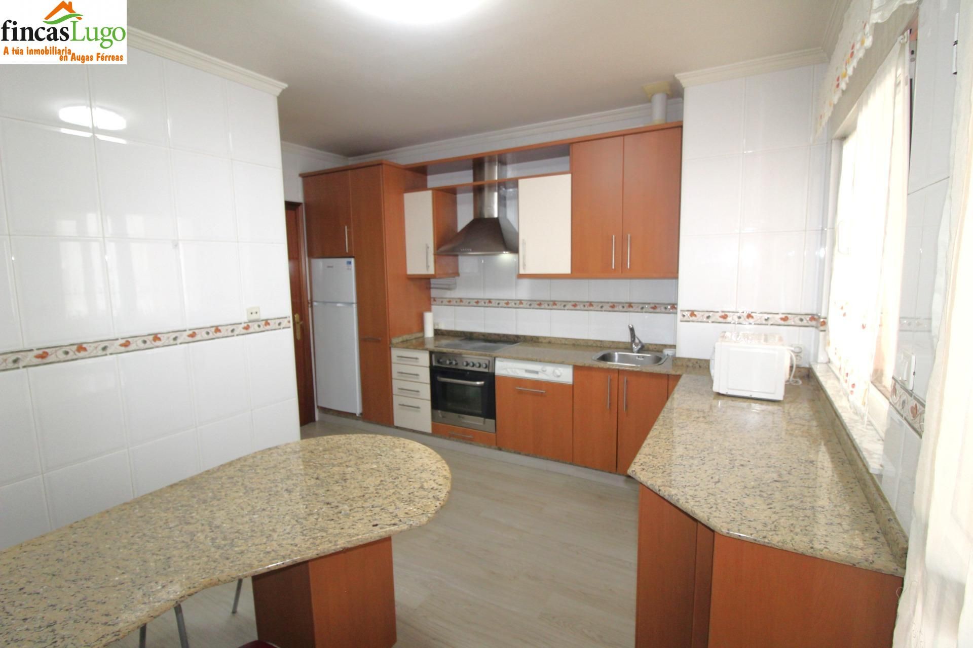 Kitchen of Duplex for sale in Lugo Capital  with Heating, Parquet flooring and Storage room