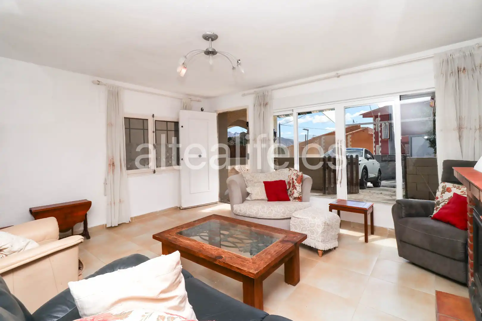 Sala de estar de Casa o chalet en venta en La Nucia con Aire acondicionado, Jardín privado y Terraza