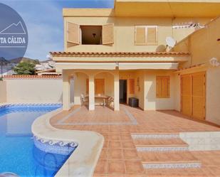 Exterior view of Single-family semi-detached for sale in Águilas  with Air Conditioner, Terrace and Swimming Pool