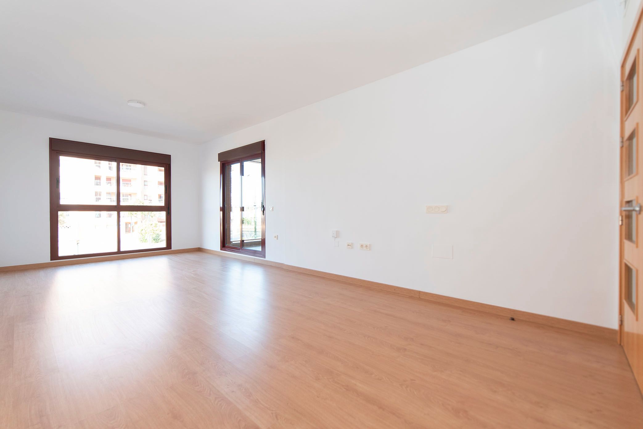 Living room of Flat for sale in  Almería Capital  with Air Conditioner, Parquet flooring and Terrace