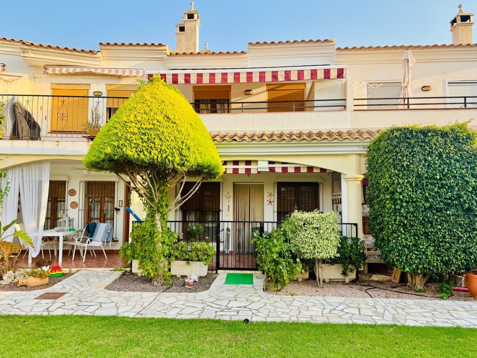 Exterior view of Single-family semi-detached for sale in Águilas  with Air Conditioner, Heating and Private garden