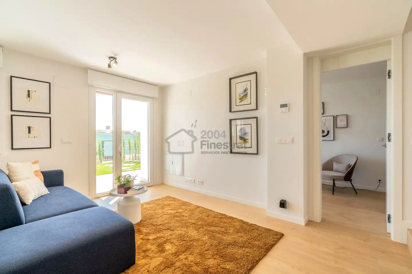 Sala de estar de Casa adosada en venta en La Nucia con Aire acondicionado, Jardín privado y Terraza