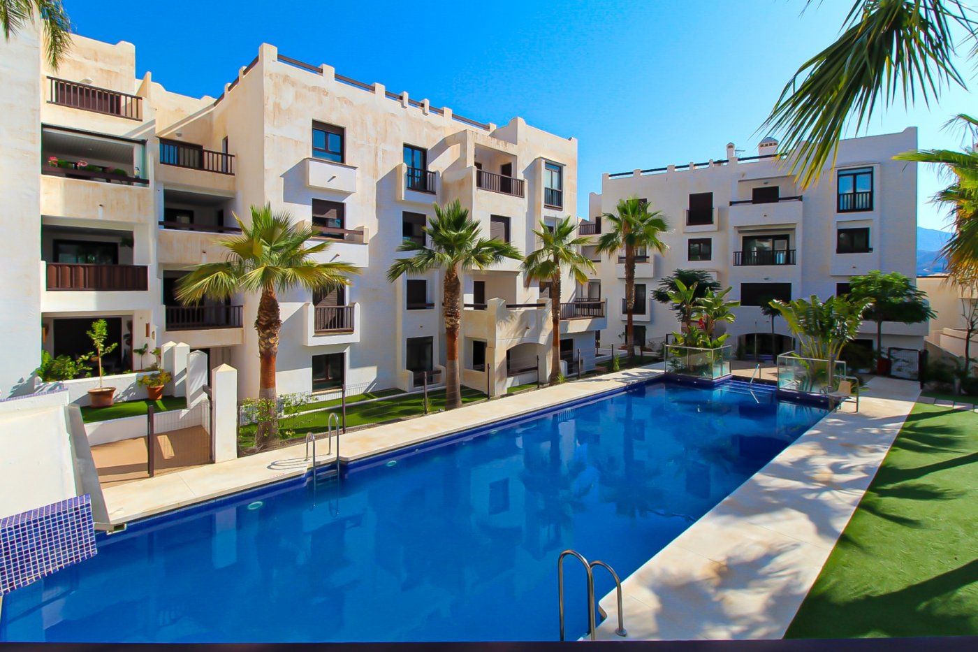 Swimming pool of Flat for sale in Salobreña  with Air Conditioner, Terrace and Storage room