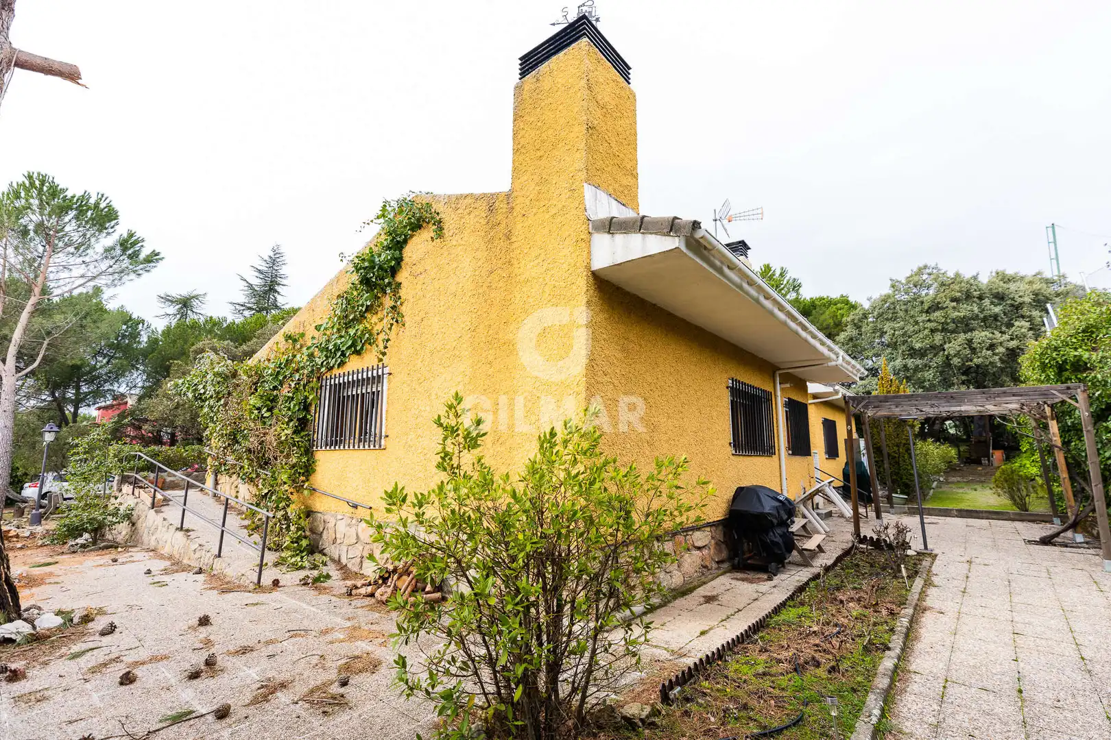 Vista exterior de Casa o chalet en venta en Hoyo de Manzanares con Calefacción, Jardín privado y Piscina