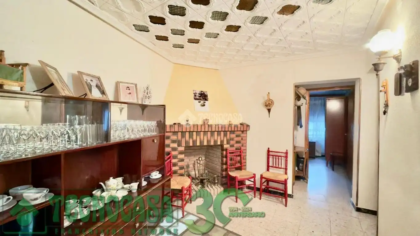 Sala d'estar de Casa adosada en venda en Quero amb Calefacció i Terrassa