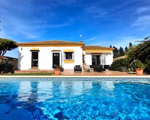 Exterior view of House or chalet for sale in Chiclana de la Frontera  with Air Conditioner, Heating and Private garden