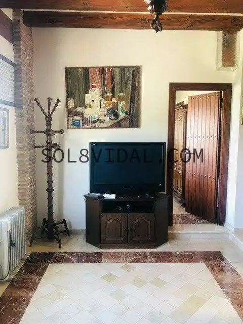 Sala d'estar de Casa o xalet en venda en Orihuela amb Aire condicionat, Jardí privat i Terrassa