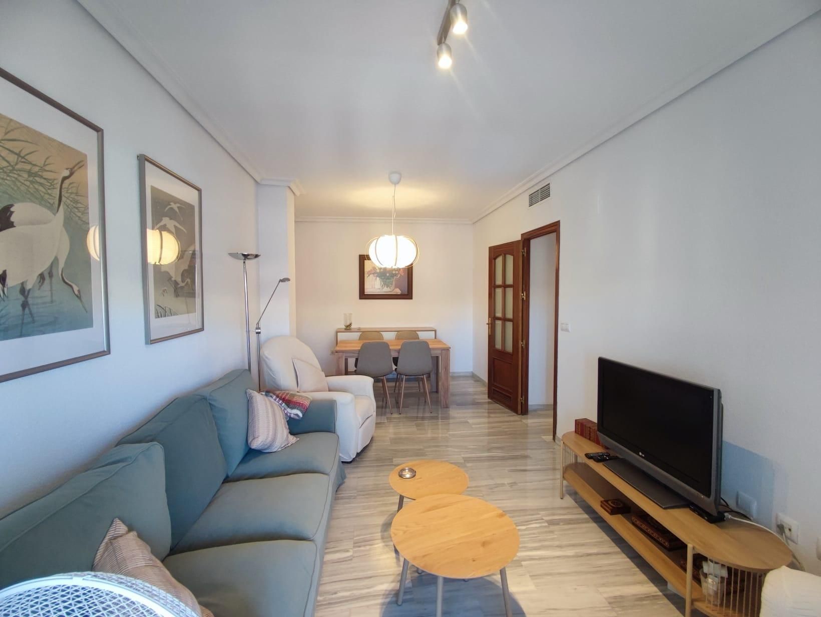 Sala de estar de Piso de alquiler en  Córdoba Capital con Aire acondicionado, Terraza y Piscina comunitaria