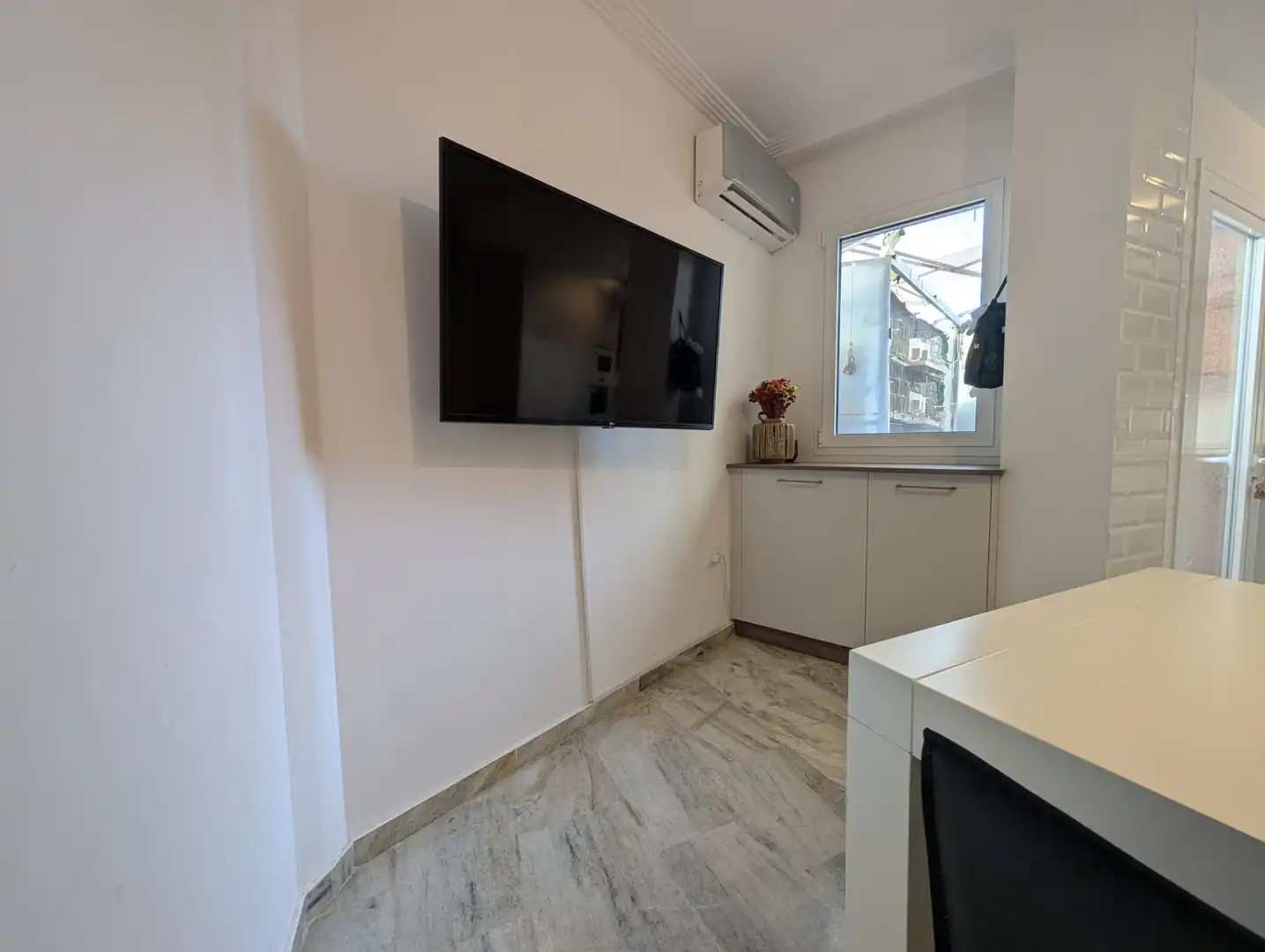 Sala de estar de Casa adosada en venta en Aljaraque con Aire acondicionado y Piscina comunitaria