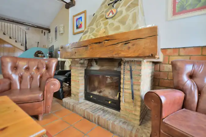 Sala de estar de Casa adosada en venta en Benaoján con Calefacción, Terraza y Jacuzzi