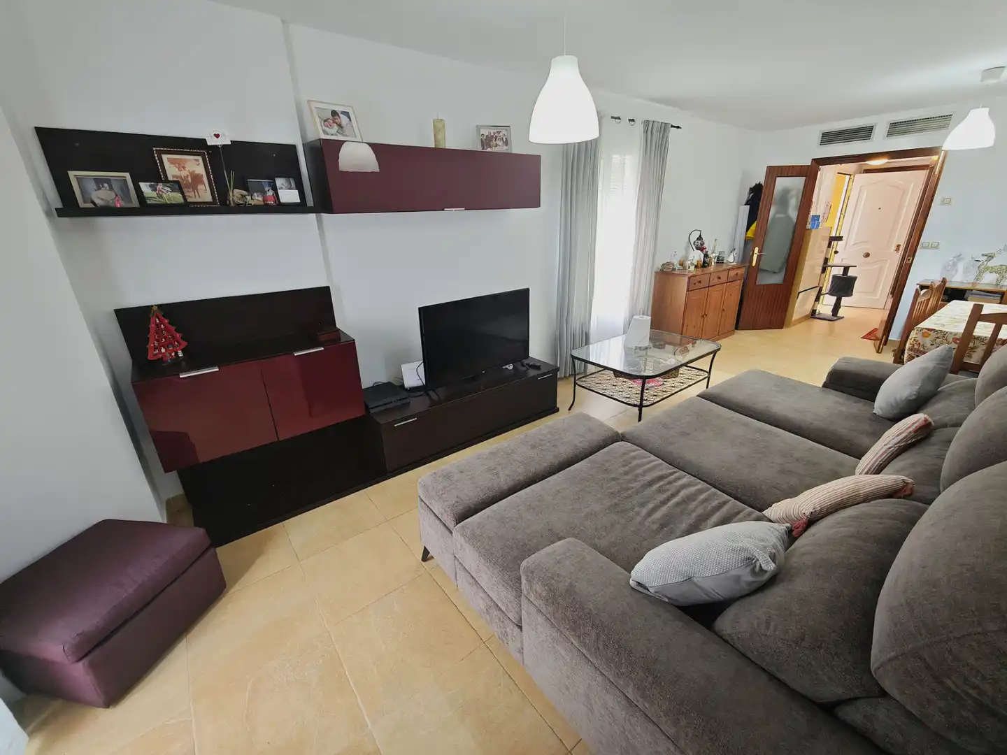 Sala d'estar de Casa adosada en venda en Lebrija amb Aire condicionat, Moblat i Forn
