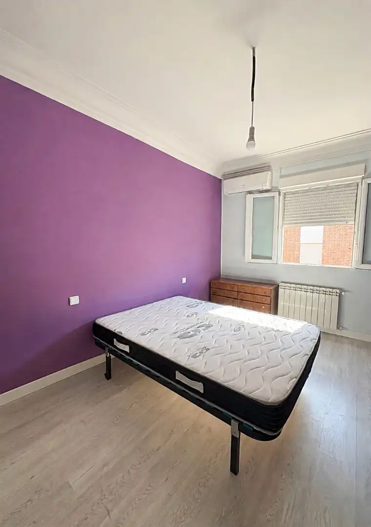 Schlafzimmer von Wohnung zum Verkauf in Madrid mit Klimaanlage und Balkon