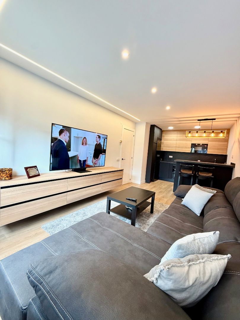 Living room of Apartment for sale in Gijón   with Heating, Private garden and Parquet flooring