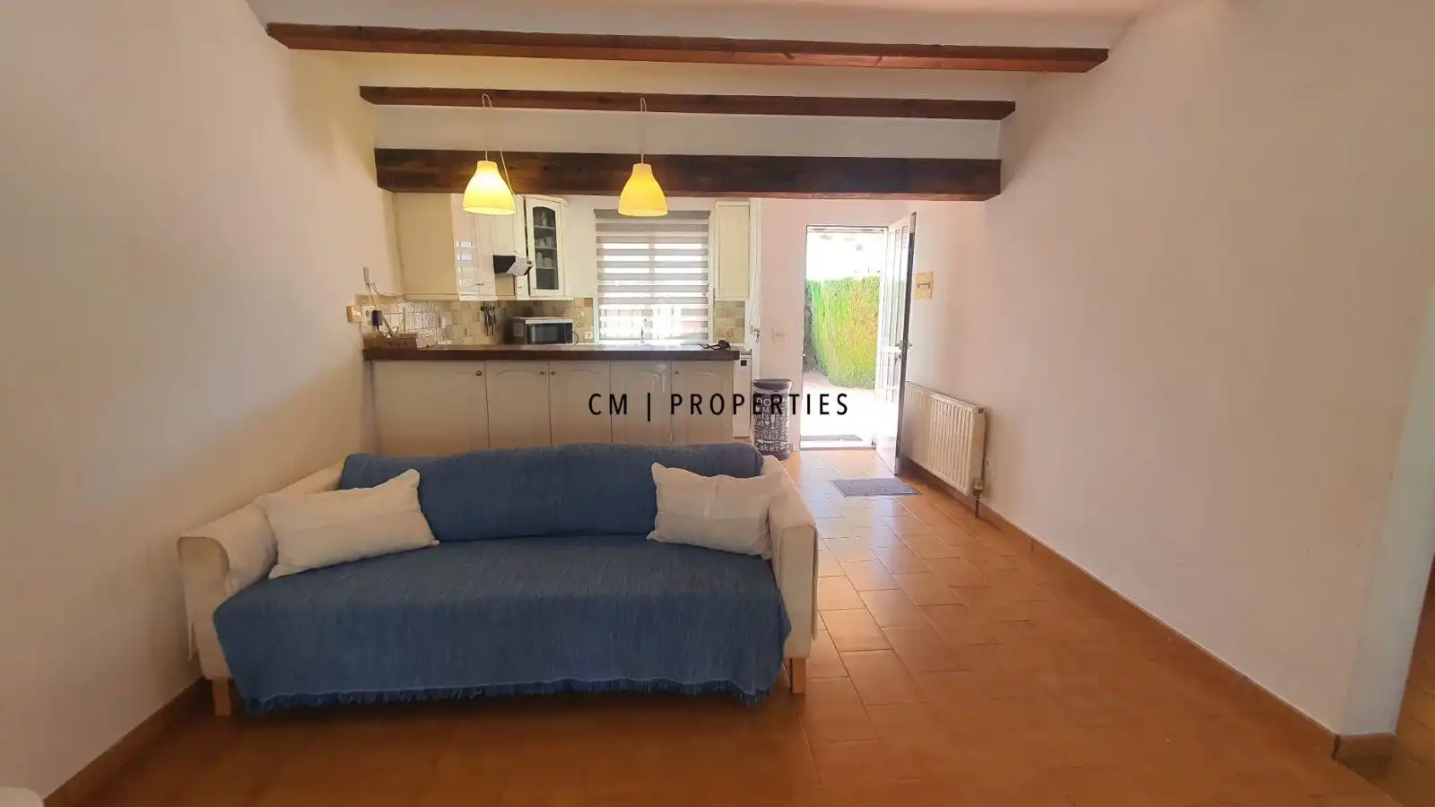 Sala d'estar de Casa adosada en venda en Moraira amb Aire condicionat, Calefacció i Terrassa