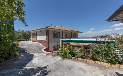 Vista exterior de Casa o xalet en venda en Cogollos de la Vega amb Calefacció, Terrassa i Traster