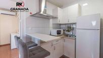 Kitchen of Apartment for sale in  Granada Capital  with Air Conditioner