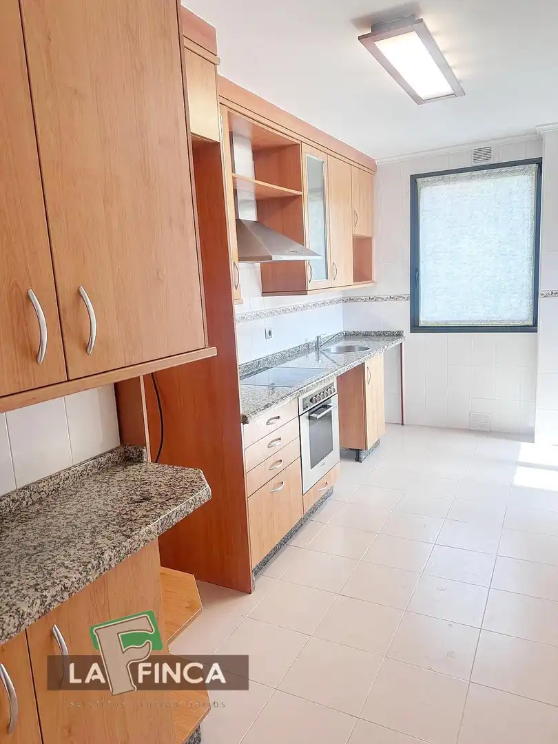Kitchen of Flat for sale in Oviedo   with Heating, Parquet flooring and Terrace