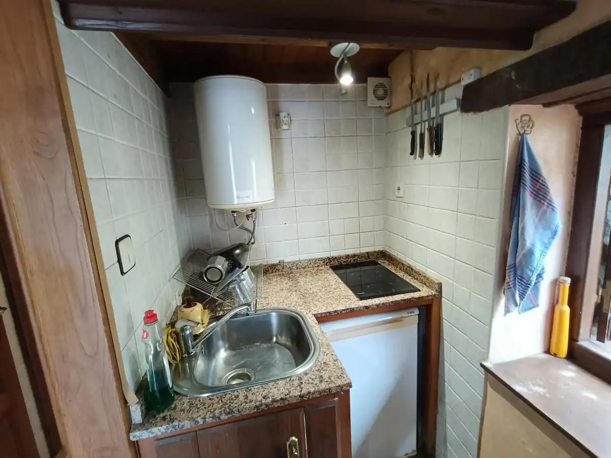 Küche von Einfamilien-Reihenhaus zum Verkauf in Llanes mit Heizung und Möbliert