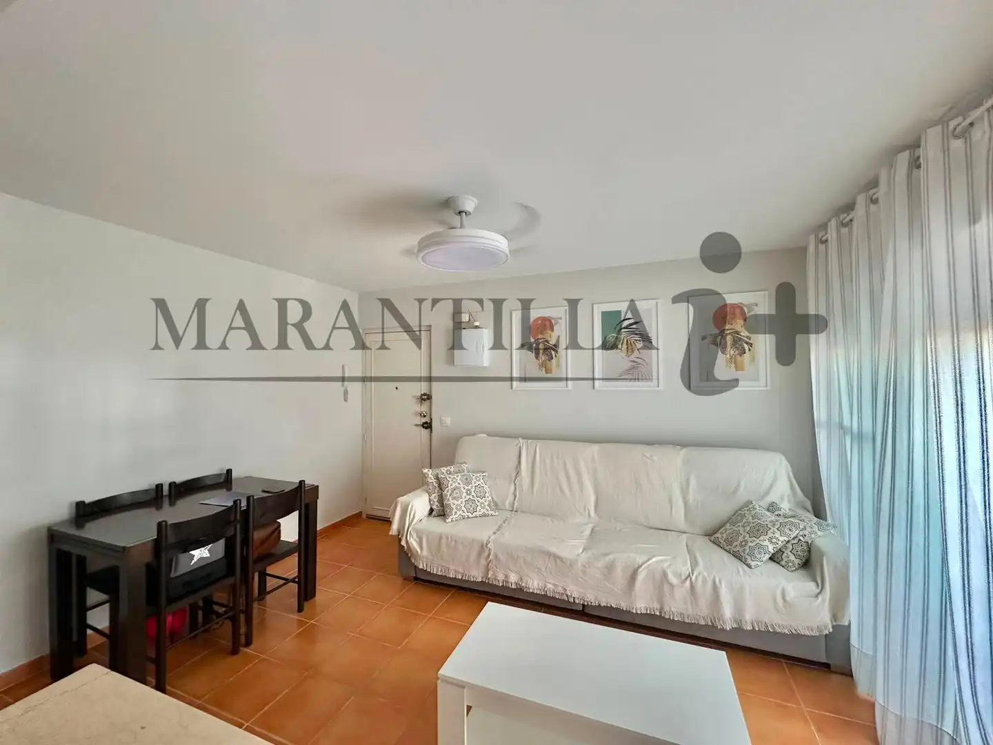 Sala de estar de Piso en venta en La Antilla con Aire acondicionado, Terraza y Amueblado